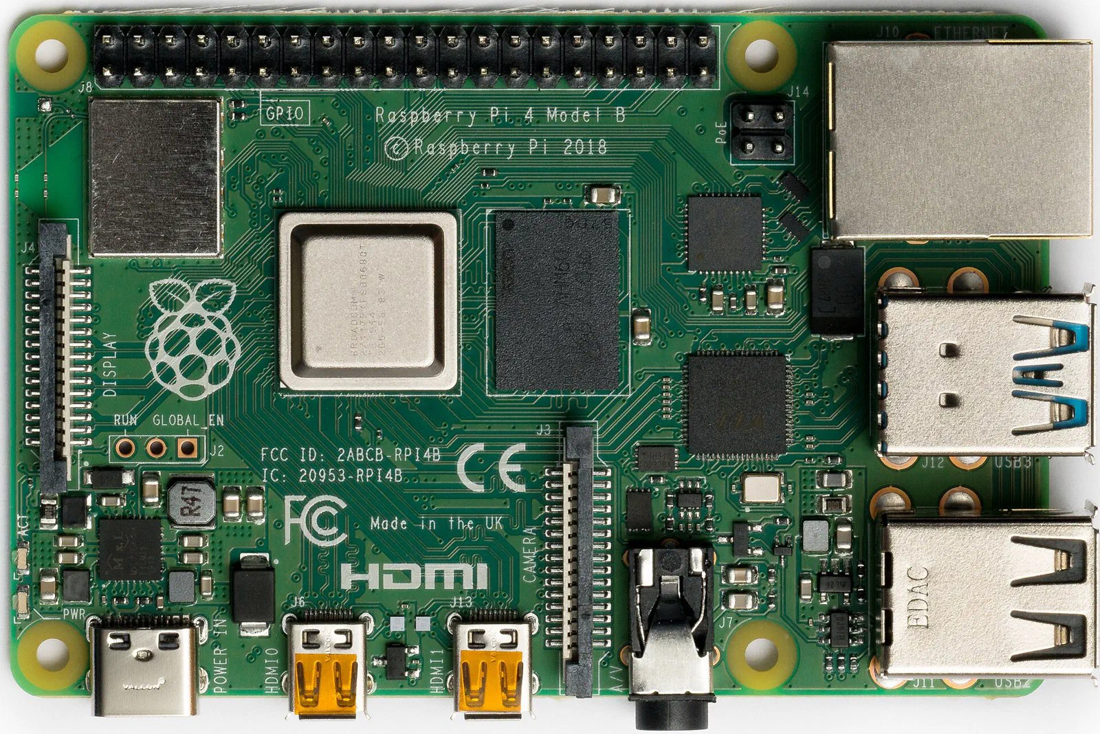 Placa Raspberry Pi 4 Model B vista de cima, com portas USB, rede e HDMI